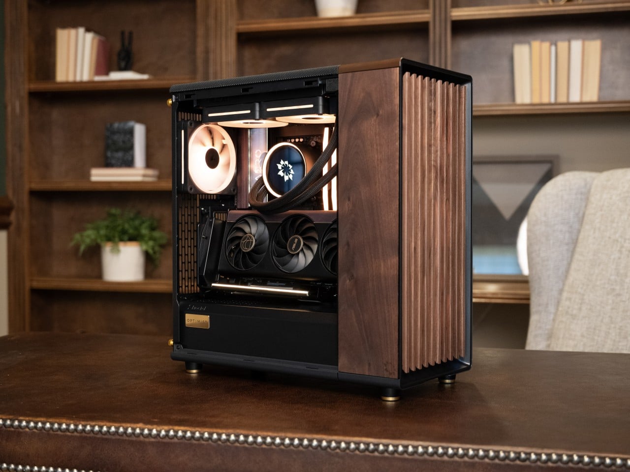 yankodesign.com - JC Torres - A Walnut and Brass Desktop PC That Still Runs an RTX 5090