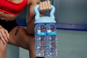 This Clip On Handle Turns Any Water Bottle Pack Into A Kettlebell