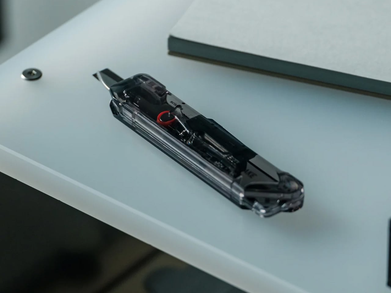 This Transparent Box Opener Handles Tape & Tags Without You Ever Putting The Package Down