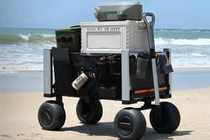 This electric beach wagon tackles soft sand with balloon tires, hub motors, and a foldable frame
