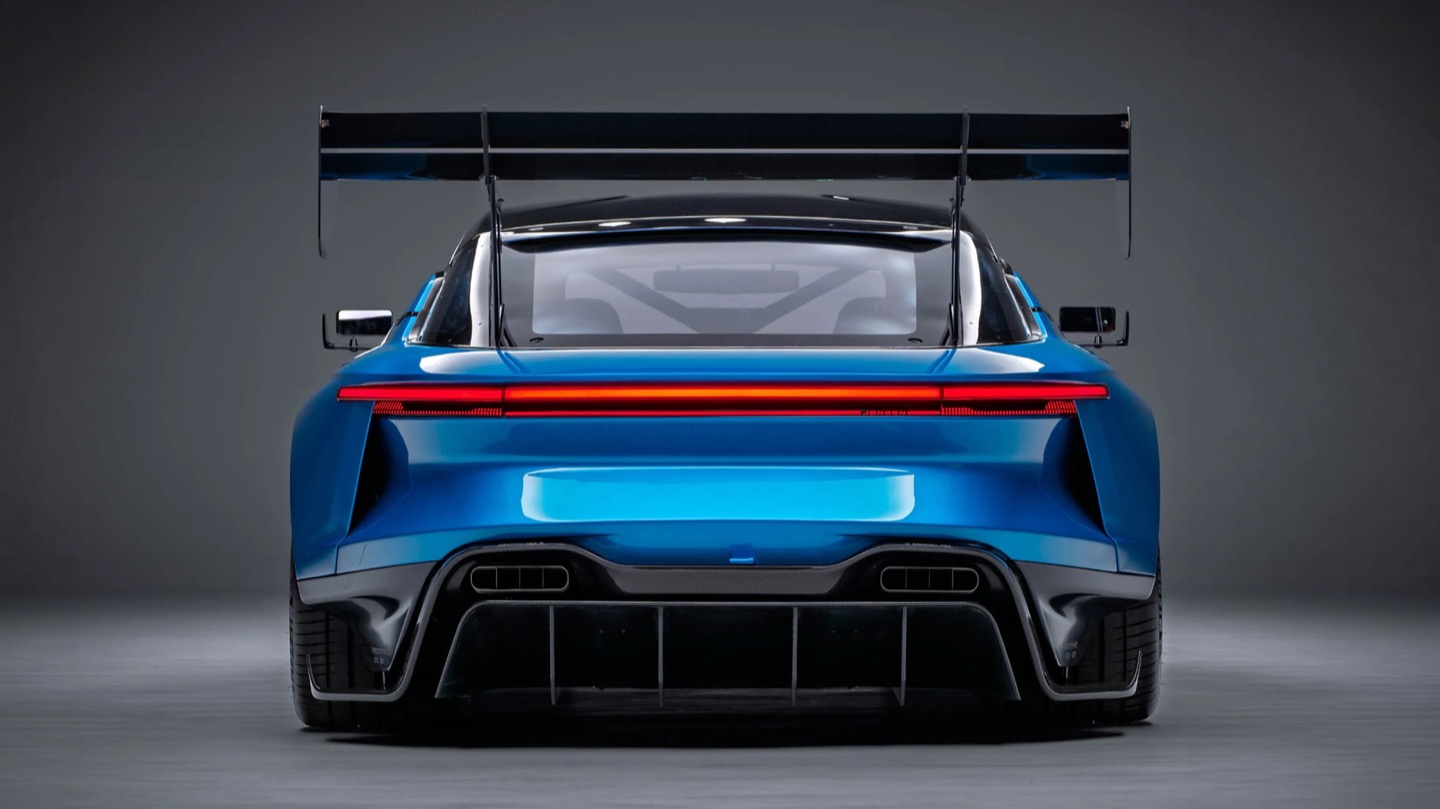 A full-width taillight and a wing pulled straight from GT3 territory.