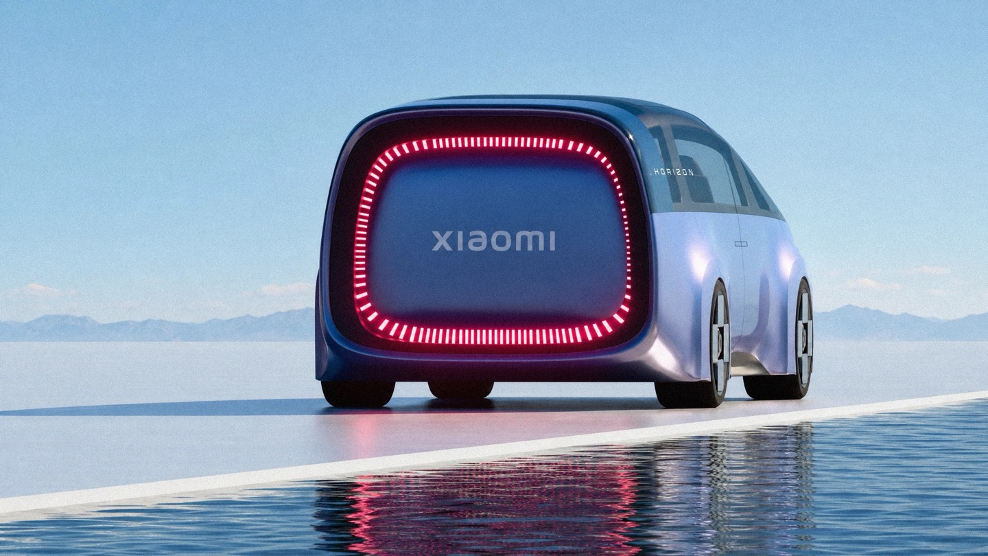 Straight-on rear view of the Horizon on a salt-flat-like surface, with its glowing red squircle taillight centered.