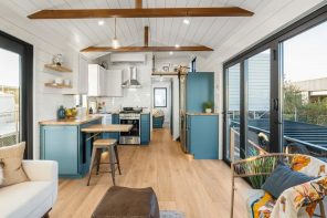 This Tiny Home Packs a Double Vanity, Trifold Glass Doors, & a Full Kitchen into 400 Square Feet