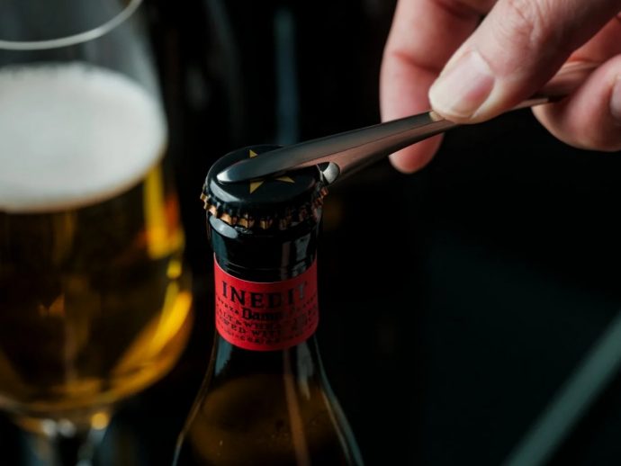 This Japanese Bottle Opener Catches the Cap So You Never Chase It Again