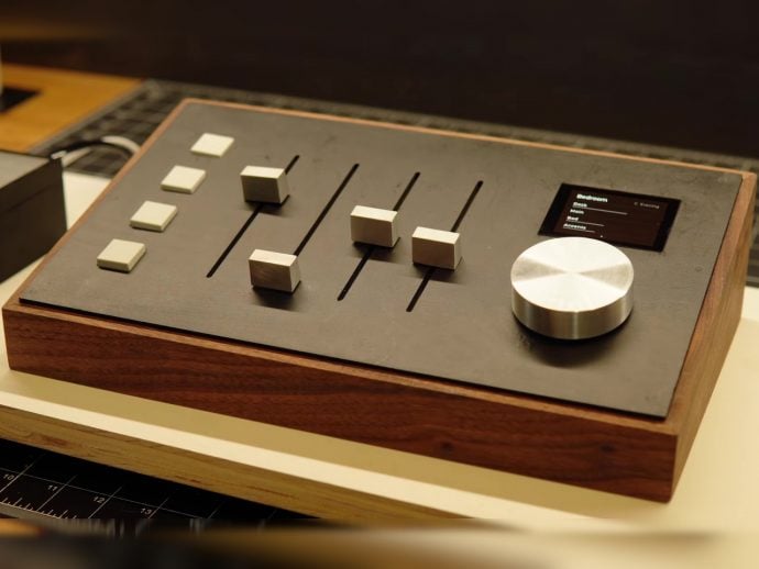 This Walnut Console Has Faders That Move Themselves to Match Your Lights