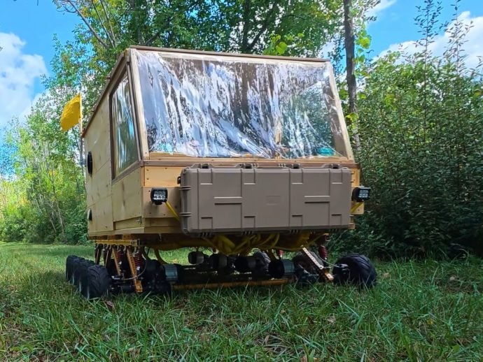 YouTuber builds 8-wheel electric wooden camper that spins 360-degrees and rides like a tank