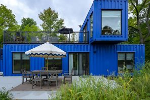 Three Shipping Containers Become a Bright Blue Wisconsin Retreat With a Rooftop Deck