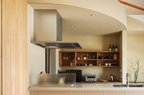 A Curved Timber Core Divides This Compact Kyoto Home Without Closing It Off