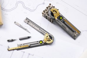 This 9-in-1 folding titanium ruler can draw circles, slice paper, and eject your SIM card
